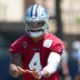 Aug 1, 2026; Oxnard, CA, USA; Dallas Cowboys quarterback Dak Prescott (4) takes the snap at training camp at River Ridge Playing Fields.