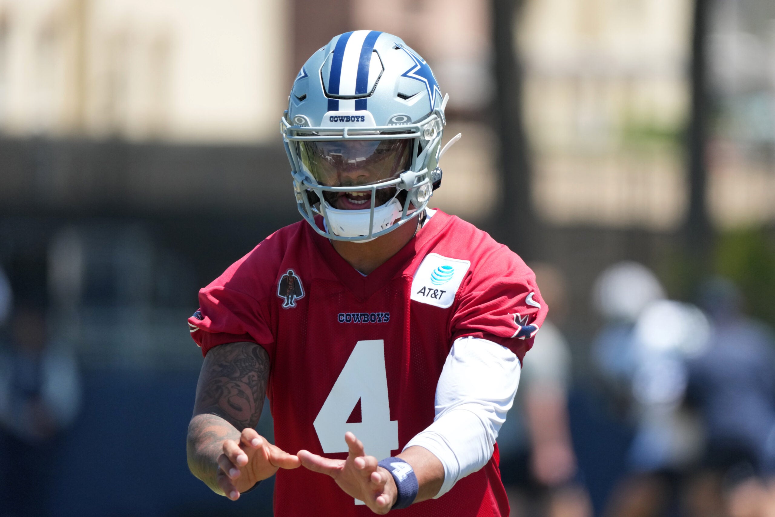 Aug 1, 2026; Oxnard, CA, USA; Dallas Cowboys quarterback Dak Prescott (4) takes the snap at training camp at River Ridge Playing Fields.