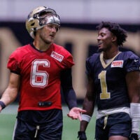 Aug 02, 2026; Metairie, LA, USA; New Orleans Saints quarterback Tyler Shough (6) talks with cornerback Kool-Aid McKinstry (1) during training camp at Ochsner Sports Performance Center.