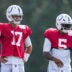 Indianapolis Colts quarterback Daniel Jones (17) waits between drills with Indianapolis Colts quarterback Anthony Richardson Sr. (5) on Monday, Aug. 3, 2026, during practice at Colts Camp at Grand Park in Westfield.