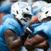 JC Latham Tennessee Titans right tackle Darnell Wright contract NFL news