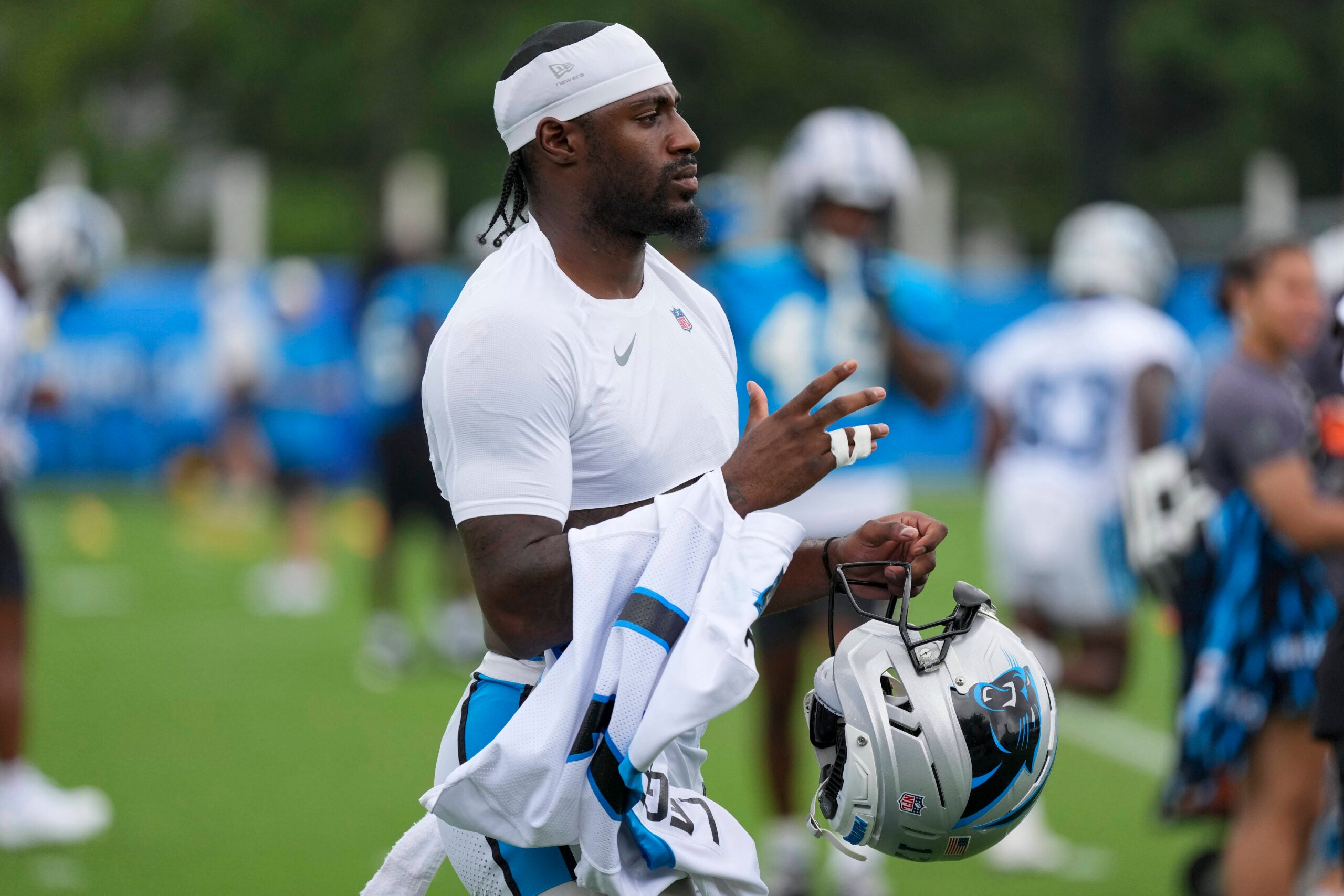 Aug 4, 2026; Charlotte, NC, USA; Carolina Panthers wide receiver Xavier Legette (17) walks over to the drills during training camp at Bank of America Stadium.