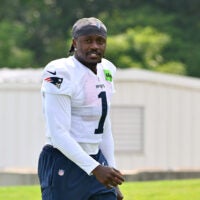 Jul 28, 2026; Foxborough, MA, USA; New England Patriots wide receiver A.J. Brown (1) walks to practice for training camp at Gillette Stadium.