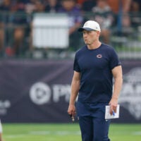 Aug 5, 2026; Lake Forest, IL, USA; Chicago Bears head coach Ben Johnson walks on the field during training camp at Halas Hall.