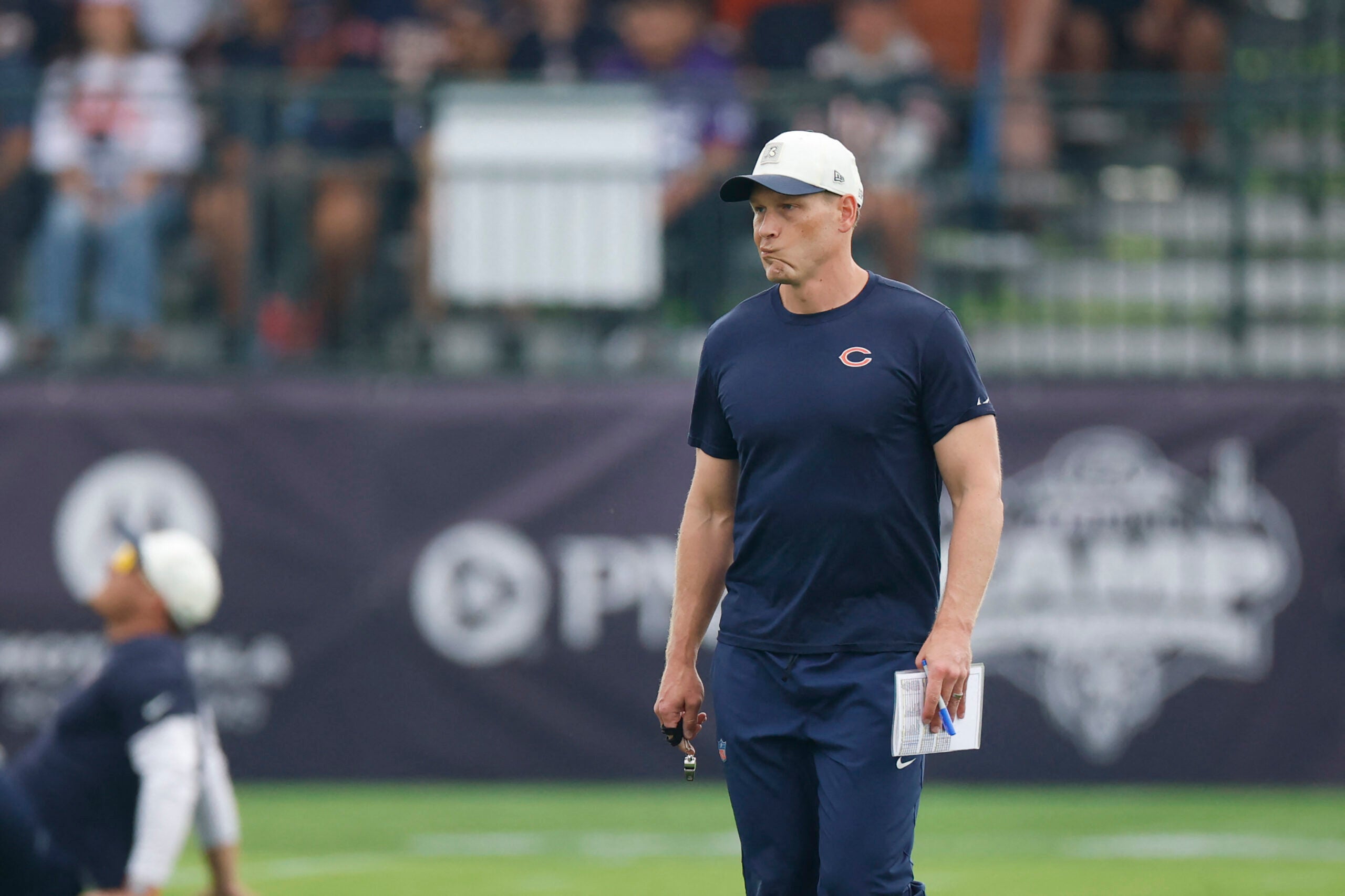 Aug 5, 2026; Lake Forest, IL, USA; Chicago Bears head coach Ben Johnson walks on the field during training camp at Halas Hall.