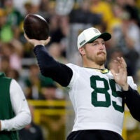 Green Bay Packers tight end Tucker Kraft (85) attempts a quarterback challenge during Green Bay Packers Family Night on Aug. 7, 2026, at Lambeau Field in Green Bay, Wis.