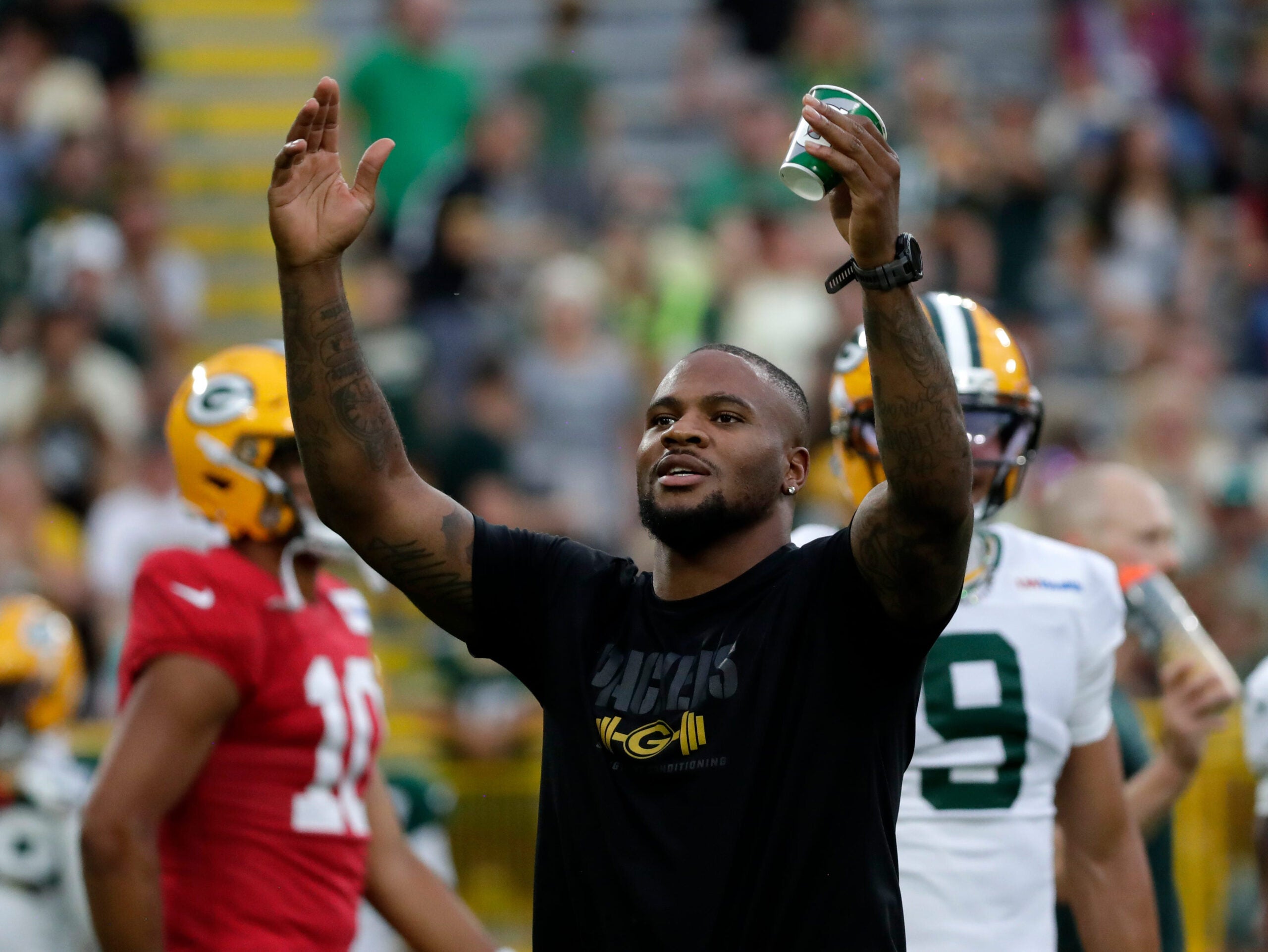 Green Bay Packers edge defender Micah Parsons hype up the crowd at Green Bay Packers Family Night on Aug. 7, 2026, at Lambeau Field in Green Bay, Wis.