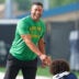 Head coach Marcus Freeman shakes hands with one of his players during a Notre Dame football practice at Irish Athletic Center on Saturday, Aug. 8, 2026, in South Bend.