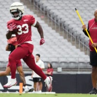Arizona Cardinals running back Trey Benson (33) practices during training camp at State Farm Stadium in Glendale on July 26, 2026.