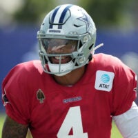 Aug 11, 2026; Woodland Hills, CA, USA; Dallas Cowboys quarterback Dak Prescott (4) reacts during a joint practice against the Los Angeles Rams at the Rams Practice Facility.