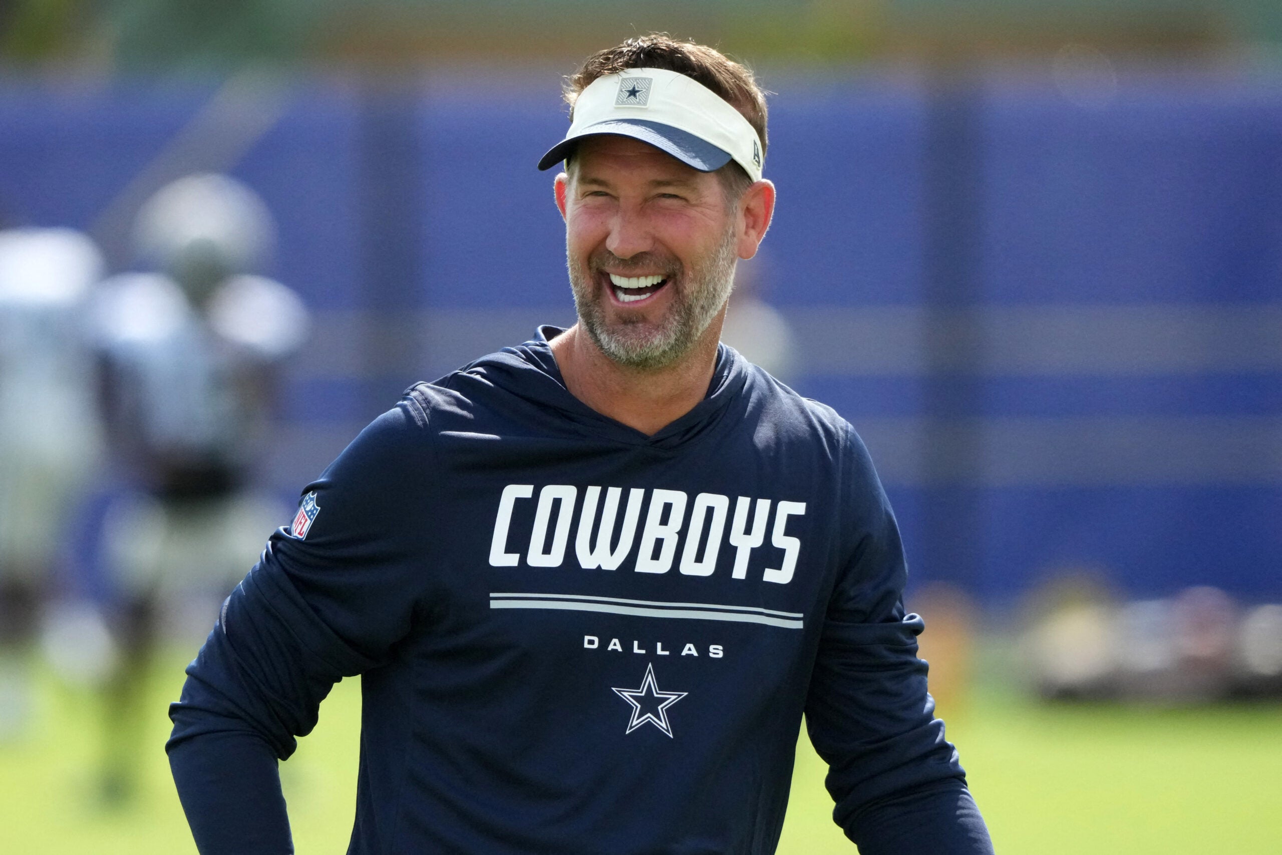 Aug 11, 2026; Woodland Hills, CA, USA; Dallas Cowboys head coach Brian Schottenheimer reacts during a joint practice against the Los Angeles Rams at the Rams Practice Facility.