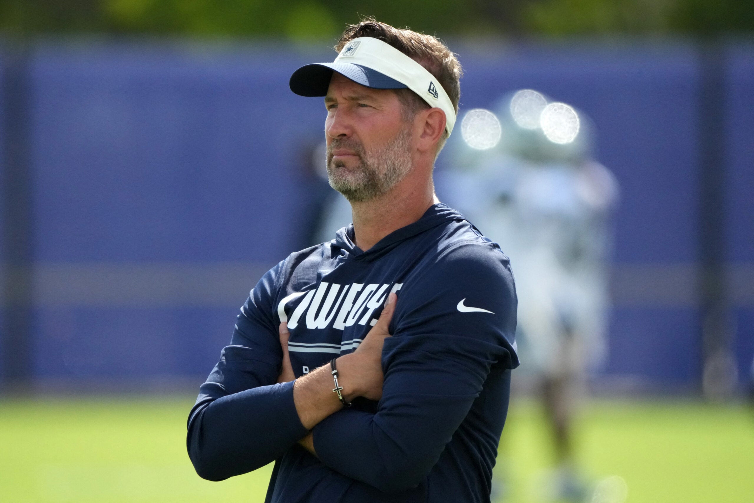 Aug 11, 2026; Woodland Hills, CA, USA; Dallas Cowboys head coach Brian Schottenheimer reacts during a joint practice against the Los Angeles Rams at the Rams Practice Facility.