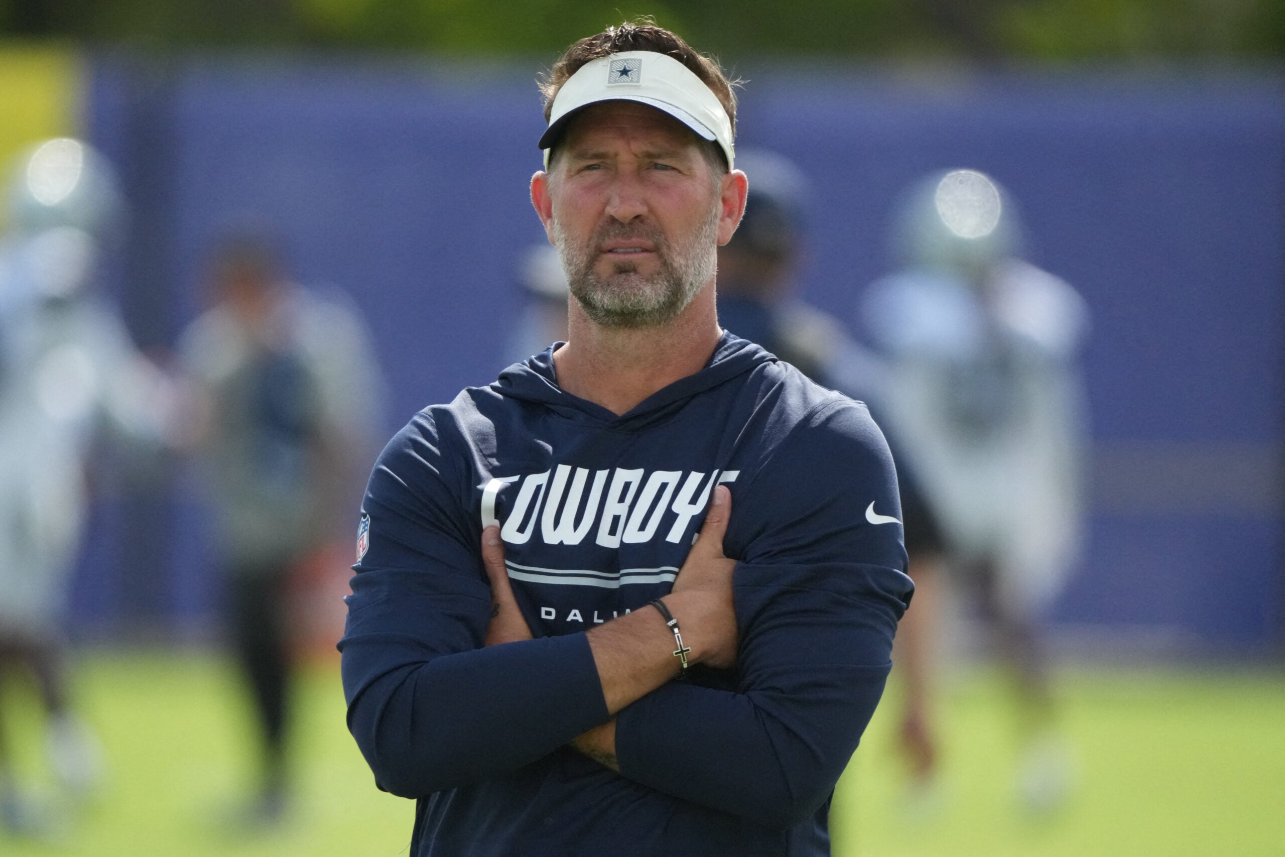 Aug 11, 2026; Woodland Hills, CA, USA; Dallas Cowboys head coach Brian Schottenheimer reacts during a joint practice against the Los Angeles Rams at the Rams Practice Facility.