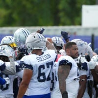 Aug 11, 2026; Woodland Hills, CA, USA; Dallas Cowboys players huddle during a joint practice against the Los Angeles Ramsat the Rams Practice Facility.