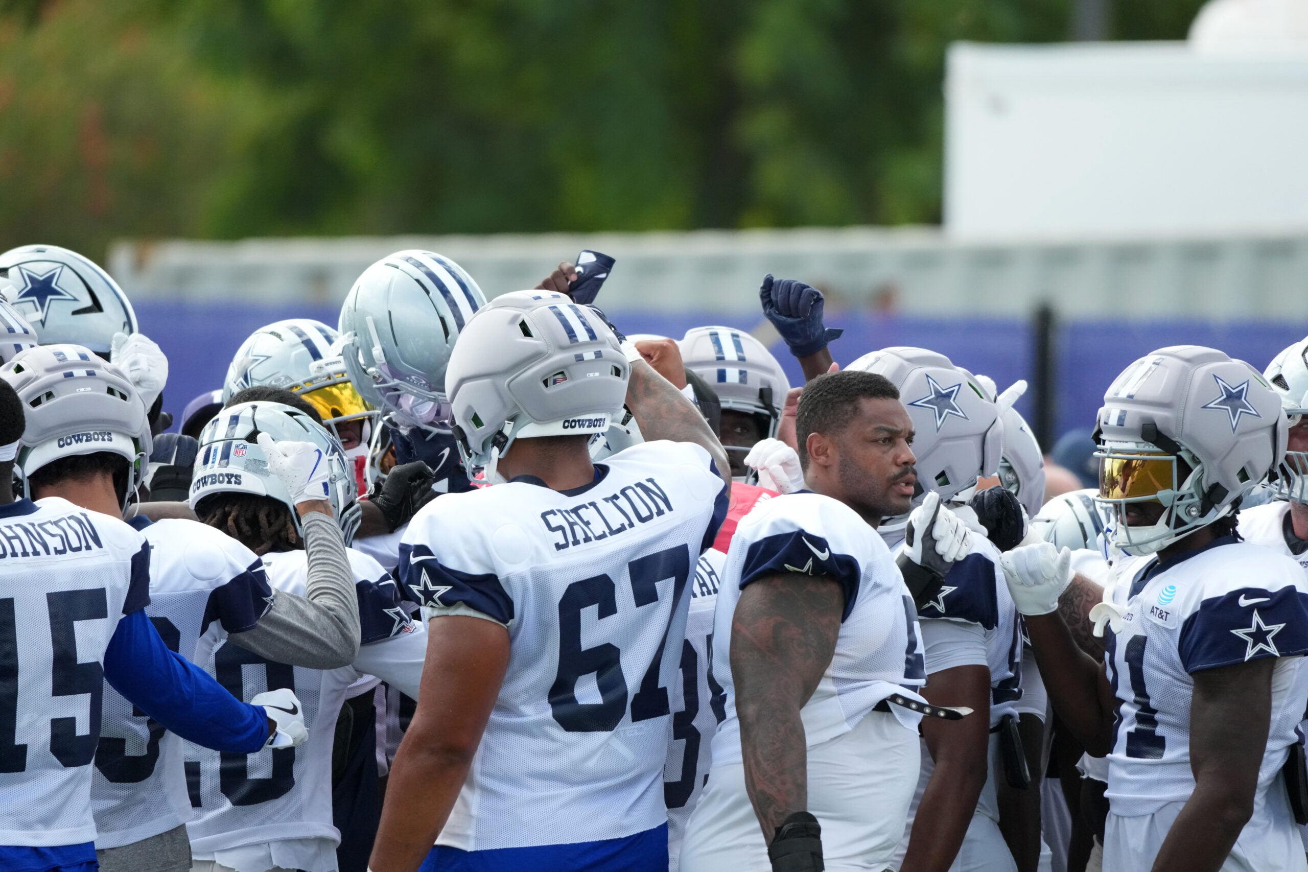 Aug 11, 2026; Woodland Hills, CA, USA; Dallas Cowboys players huddle during a joint practice against the Los Angeles Ramsat the Rams Practice Facility.