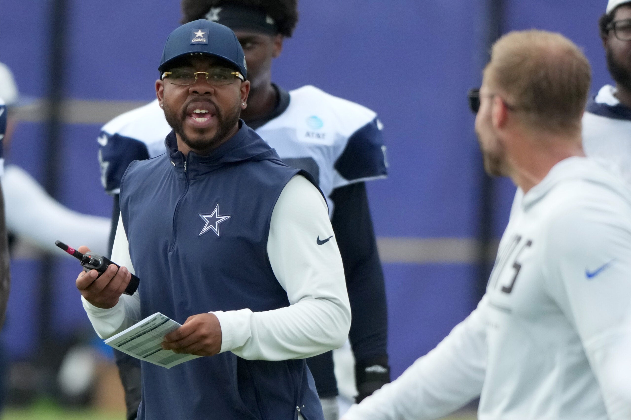 Aug 11, 2026; Woodland Hills, CA, USA; Dallas Cowboys defensive coordinator Christian Parker (left) and Los Angeles Rams head coach Sean McVay react during a joint practice at the Rams Practice Facility.