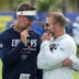 Aug 11, 2026; Woodland Hills, CA, USA; Dallas Cowboys head coach Brian Schottenheimer (left) and Los Angeles Rams head coach Sean McVay react during a joint practice at the Rams Practice Facility.
