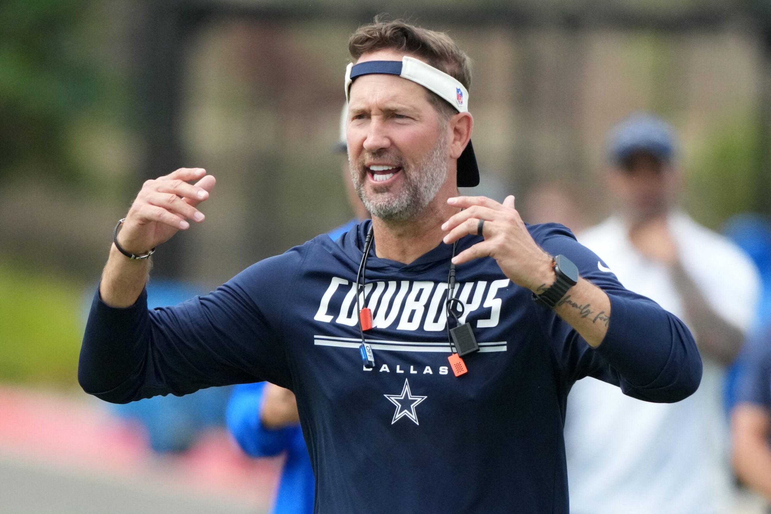 Aug 11, 2026; Woodland Hills, CA, USA; Dallas Cowboys head coach Brian Schottenheimer reacts during a joint practice against the Los Angeles Rams at the Rams Practice Facility.