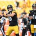 Aug 13, 2026; Pittsburgh, Pennsylvania, USA; Pittsburgh Steelers quarterbacks Will Howard (18) and Drew Allar (16) warm up for a pre-season game against the Green Bay Packers at Acrisure Stadium.