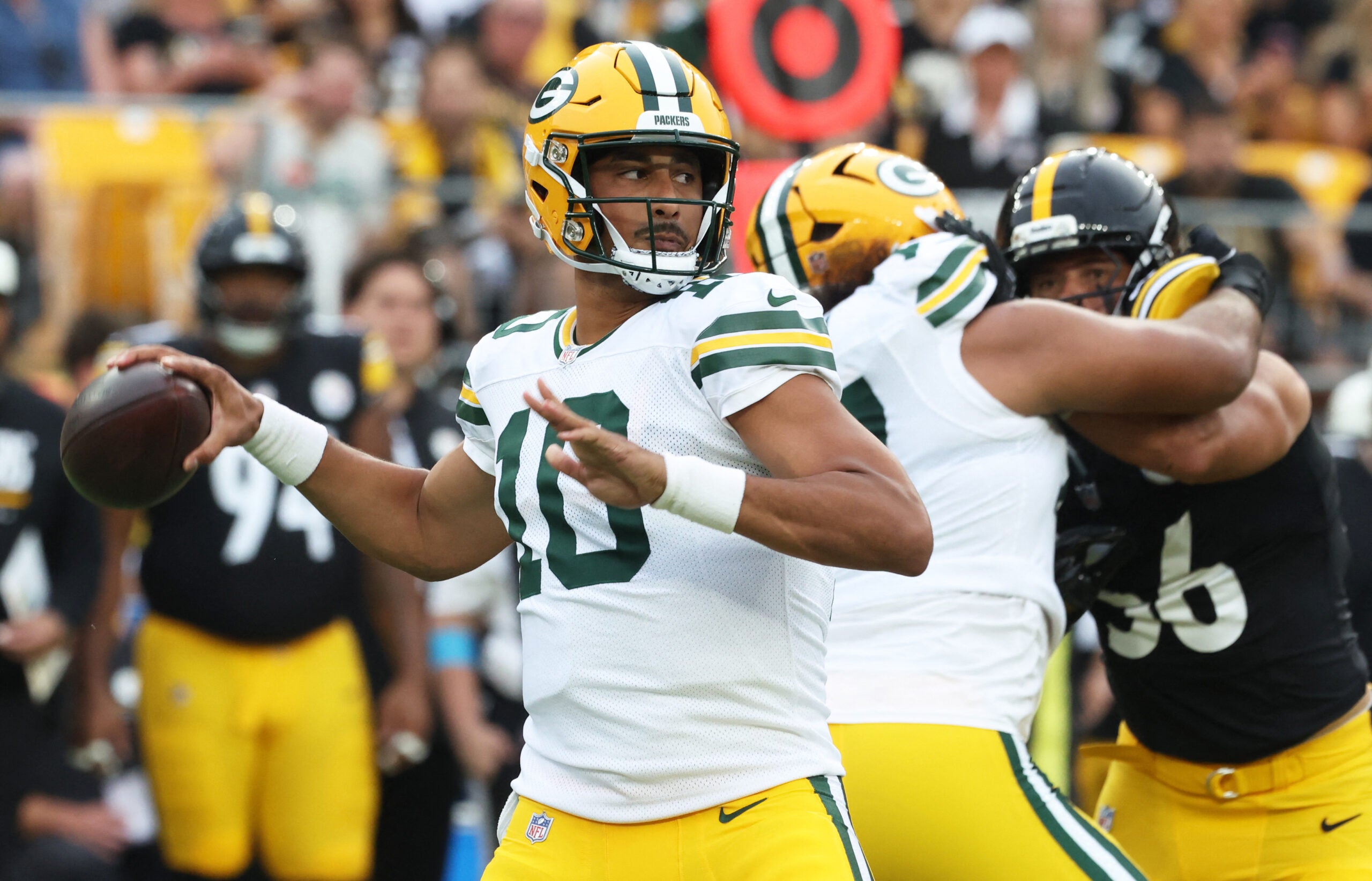 Aug 13, 2026; Pittsburgh, Pennsylvania, USA; Green Bay Packers quarterback Jordan Love (10) passes against the Pittsburgh Steelers during the first quarter at Acrisure Stadium.