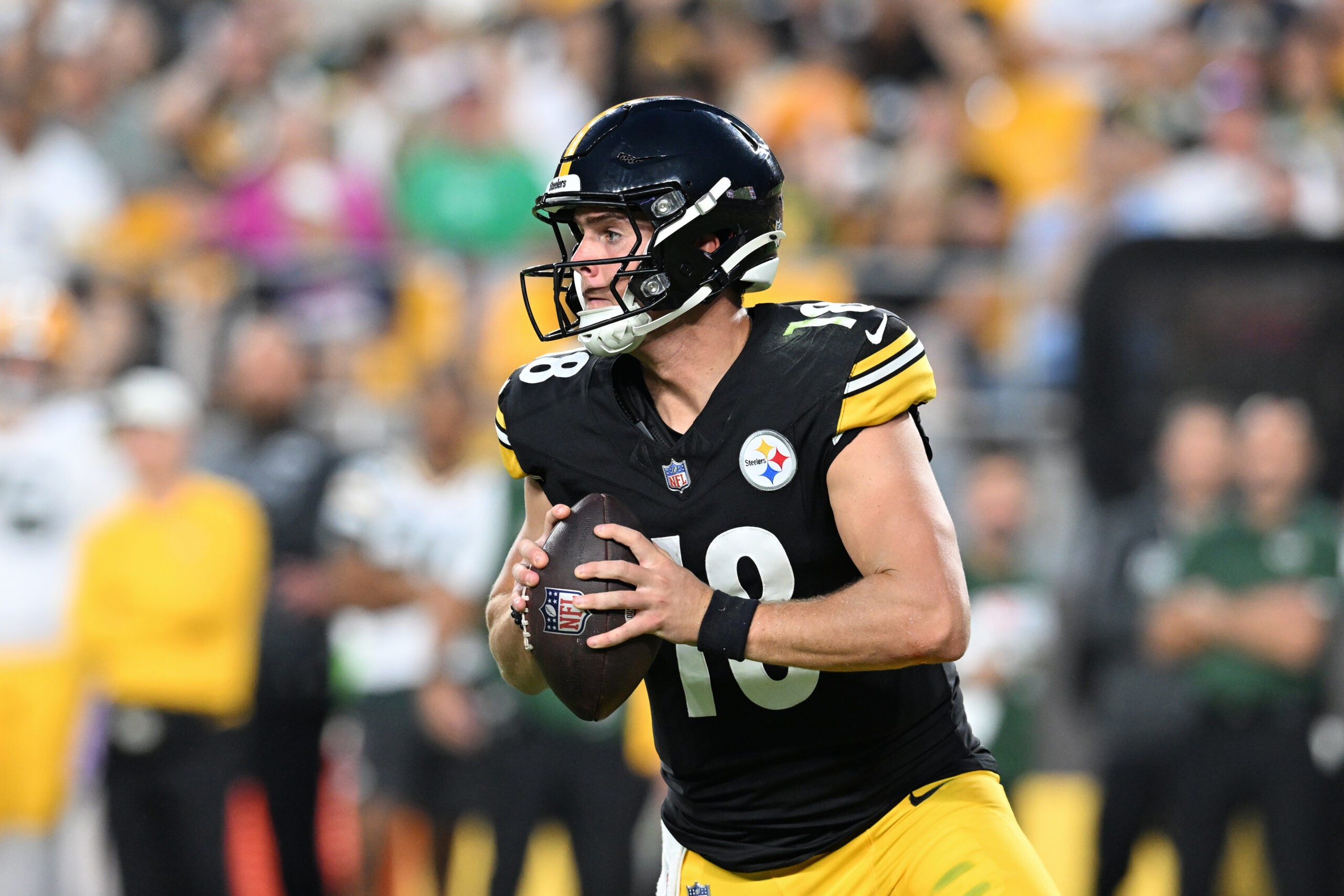 Aug 13, 2026; Pittsburgh, Pennsylvania, USA; Pittsburgh Steelers quarterback Will Howard (18) looks to pass during the first half of a game against the Green Bay Packers at Acrisure Stadium.
