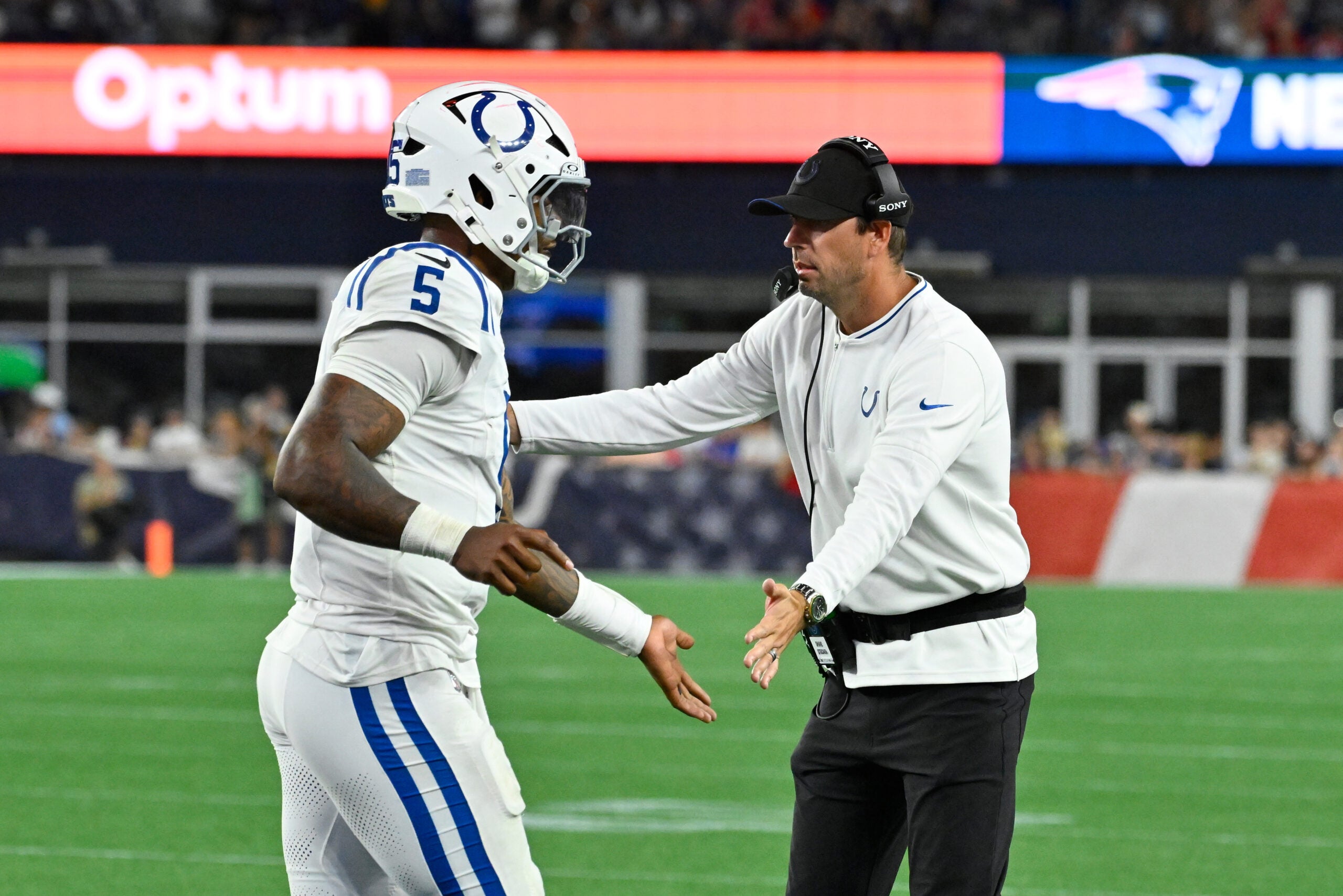 Aug 13, 2026; Foxborough, Massachusetts, USA; Indianapolis Colts head coach Shane Steichen celebrates quarterback Anthony Richardson Sr. (5) for making a touchdown against the New England Patriots during the first half at Gillette Stadium.