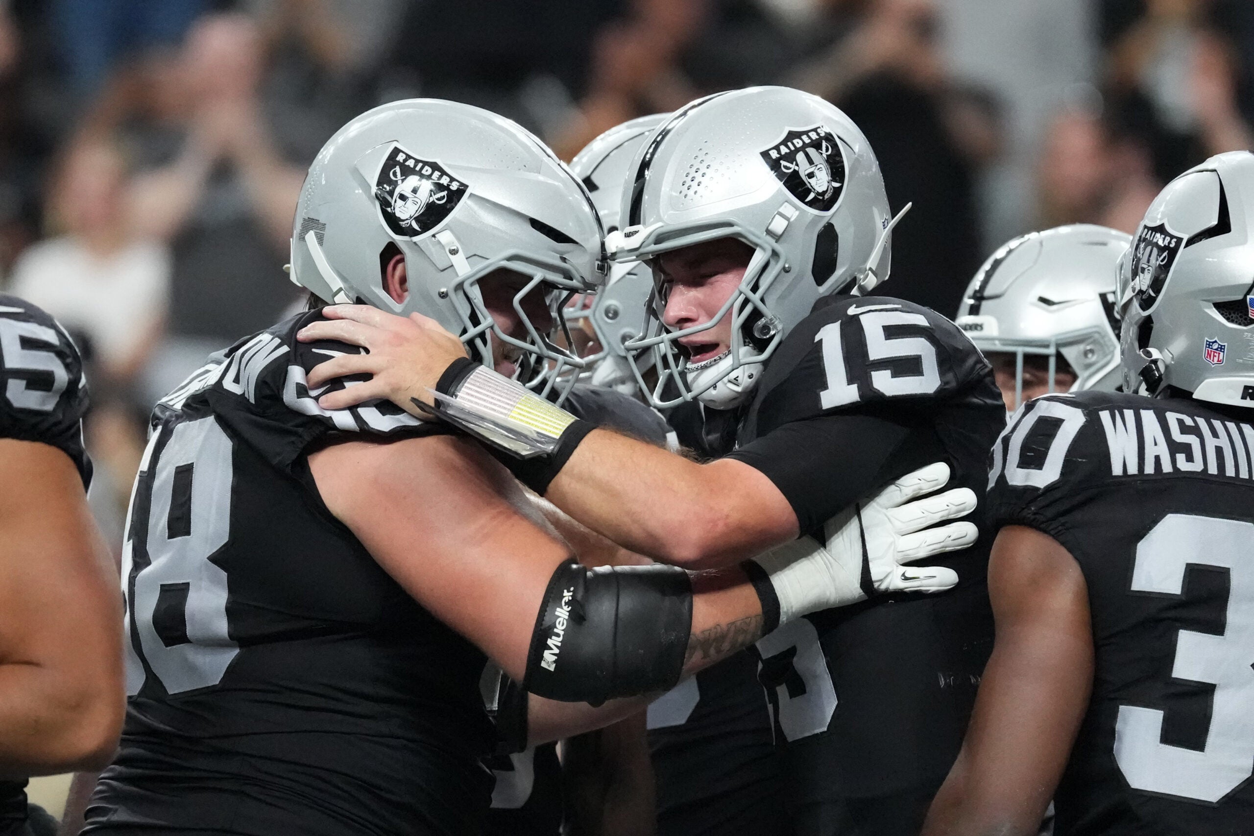 Las Vegas Raiders head coach Klint Kubiak offensive guard Jackson Powers-Johnson
