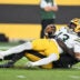 Aug 13, 2026; Pittsburgh, Pennsylvania, USA; Pittsburgh Steelers linebacker Jamin Davis (50) sacks Green Bay Packers quarterback Kyron Drones (13) during the second half at Acrisure Stadium.
