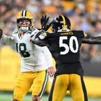 Aug 13, 2026; Pittsburgh, Pennsylvania, USA; Pittsburgh Steelers linebacker Jamin Davis (50) pressures Green Bay Packers quarterback Kyle McCord (18) during the second half at Acrisure Stadium.