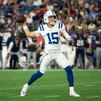 Aug 13, 2026; Foxborough, Massachusetts, USA; Indianapolis Colts quarterback Riley Leonard (15) throws during a preseason game against the New England Patriots at Gillette Stadium.