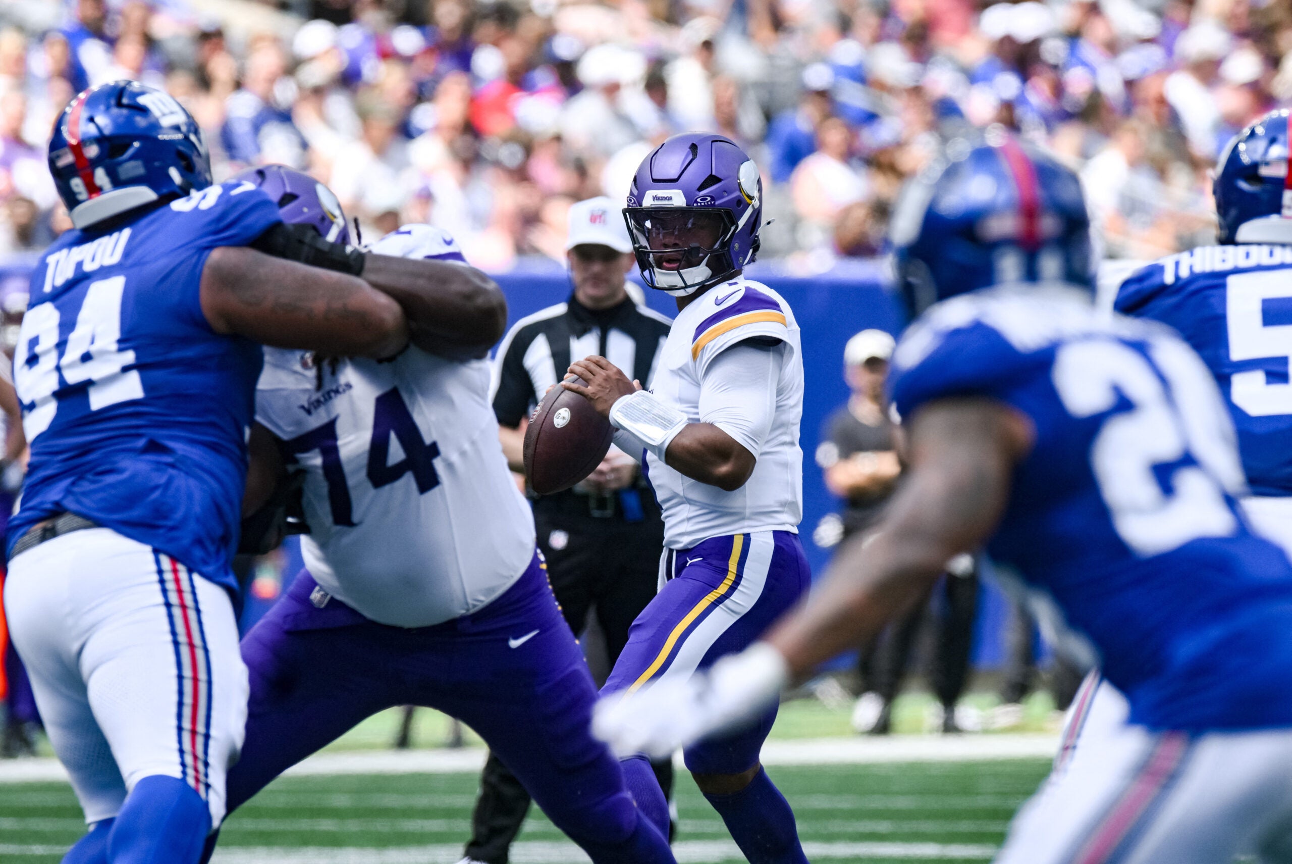 Aug 15, 2026; East Rutherford, New Jersey, USA; Minnesota Vikings quarterback Kyler Murray (1) looks to pass the ball against the New York Giants during the first half at MetLife Stadium.