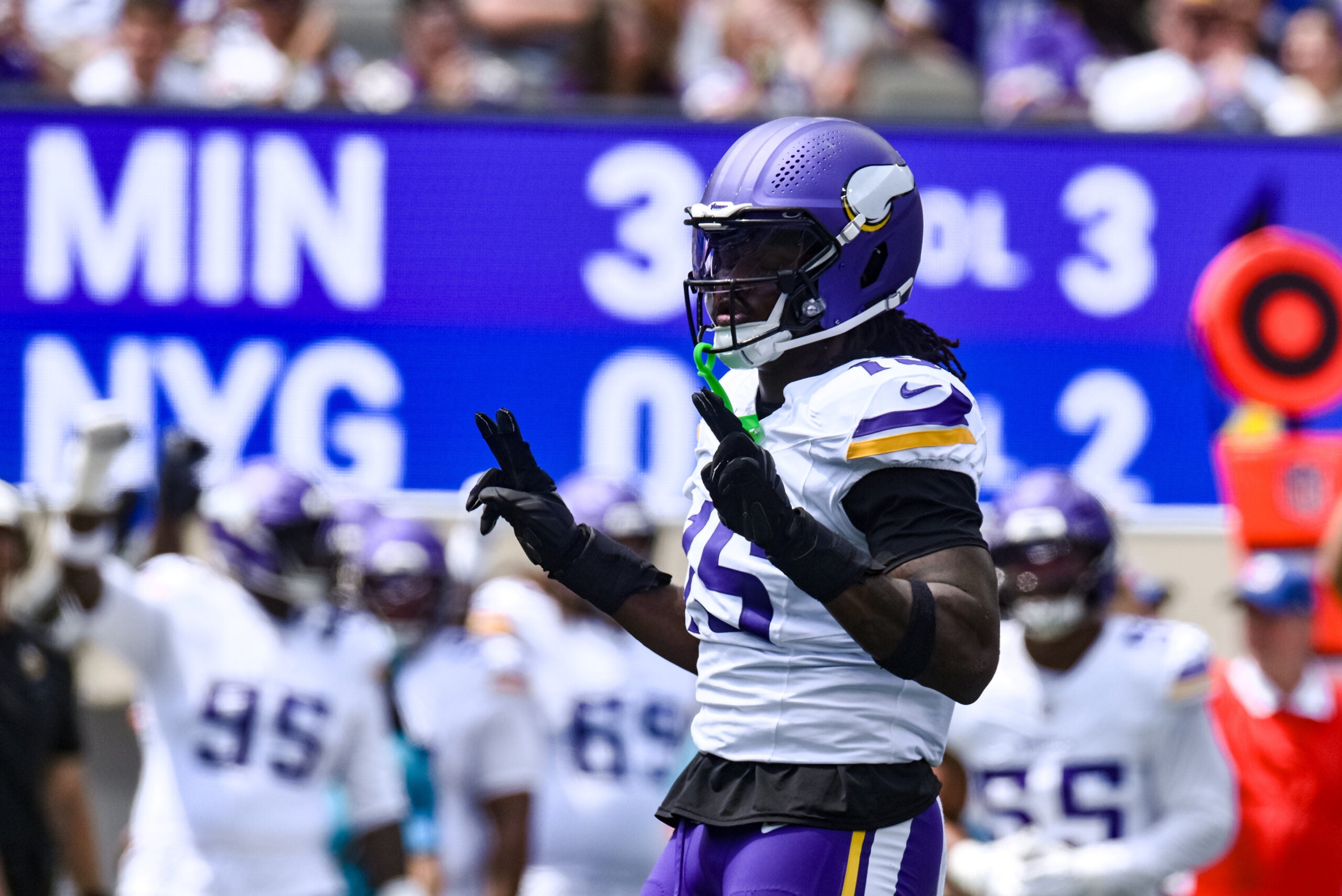 Aug 15, 2026; East Rutherford, New Jersey, USA; Minnesota Vikings linebacker Dallas Turner (15) reacts after sacking New York Giants quarterback Jaxson Dart during the first half at MetLife Stadium.