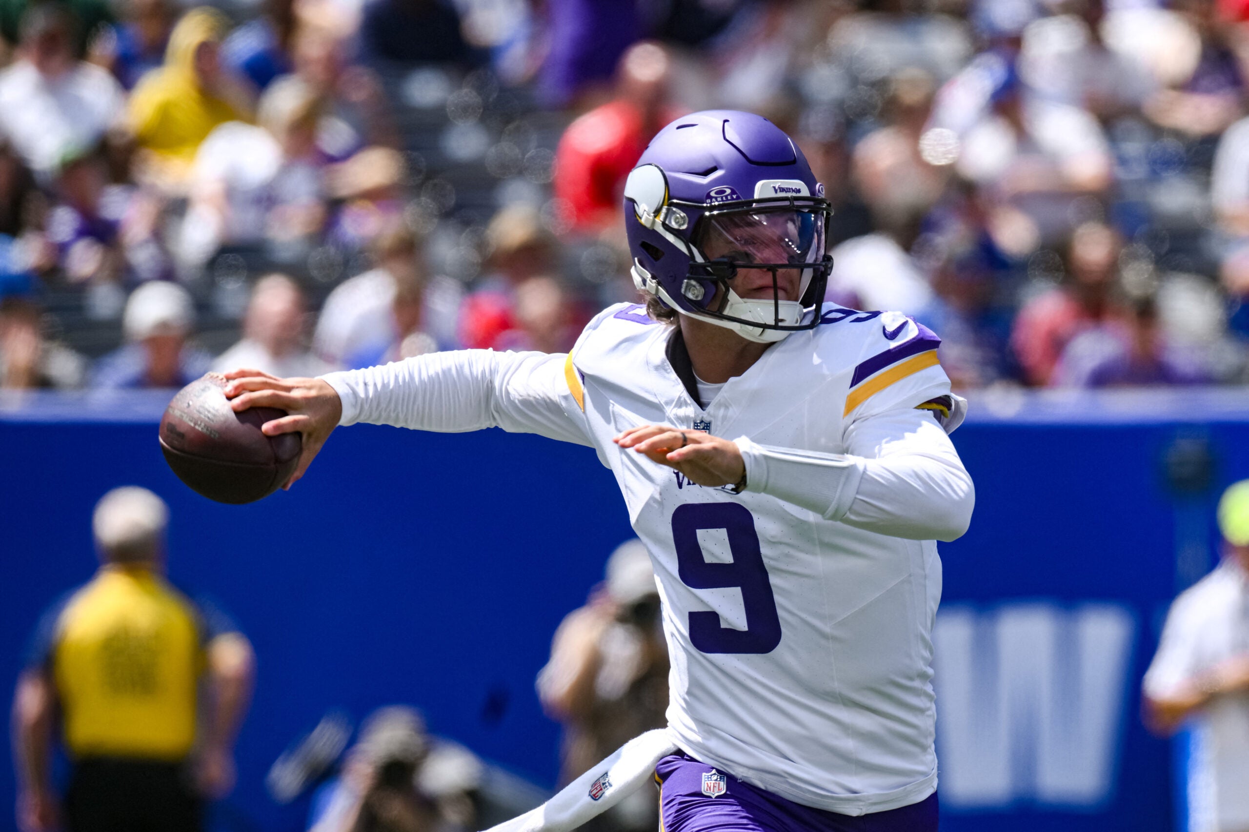Aug 15, 2026; East Rutherford, New Jersey, USA; Minnesota Vikings quarterback J.J. McCarthy (9) throws a pass against the New York Giants during the first half at MetLife Stadium.