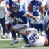 Aug 15, 2026; East Rutherford, New Jersey, USA; New York Giants running back Cam Skattebo (44) carries the ball as Minnesota Vikings defensive end Tyrion Ingram-Dawkins (90) tackles during the first half at MetLife Stadium.