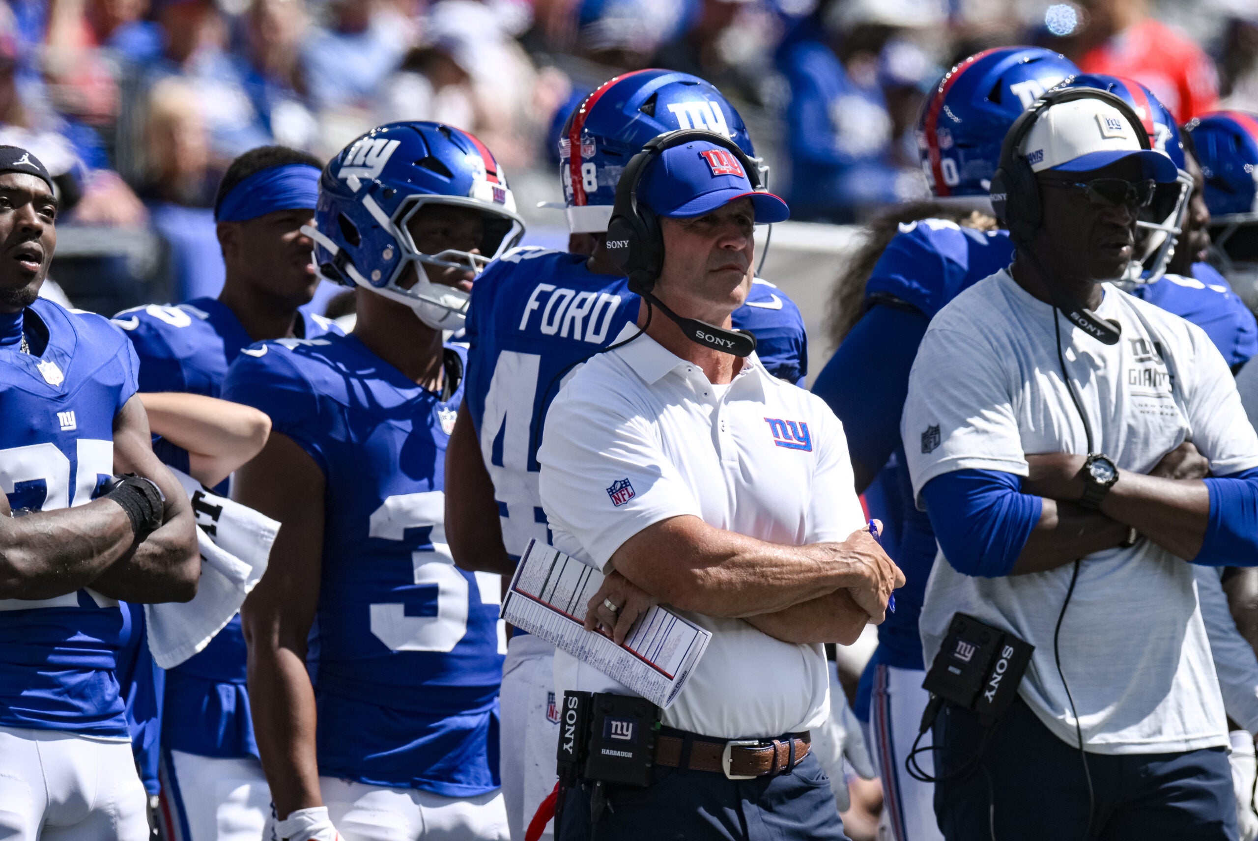 Aug 15, 2026; East Rutherford, New Jersey, USA; New York Giants head coach John Harbaugh looks on during the first half against the Minnesota Vikings at MetLife Stadium.