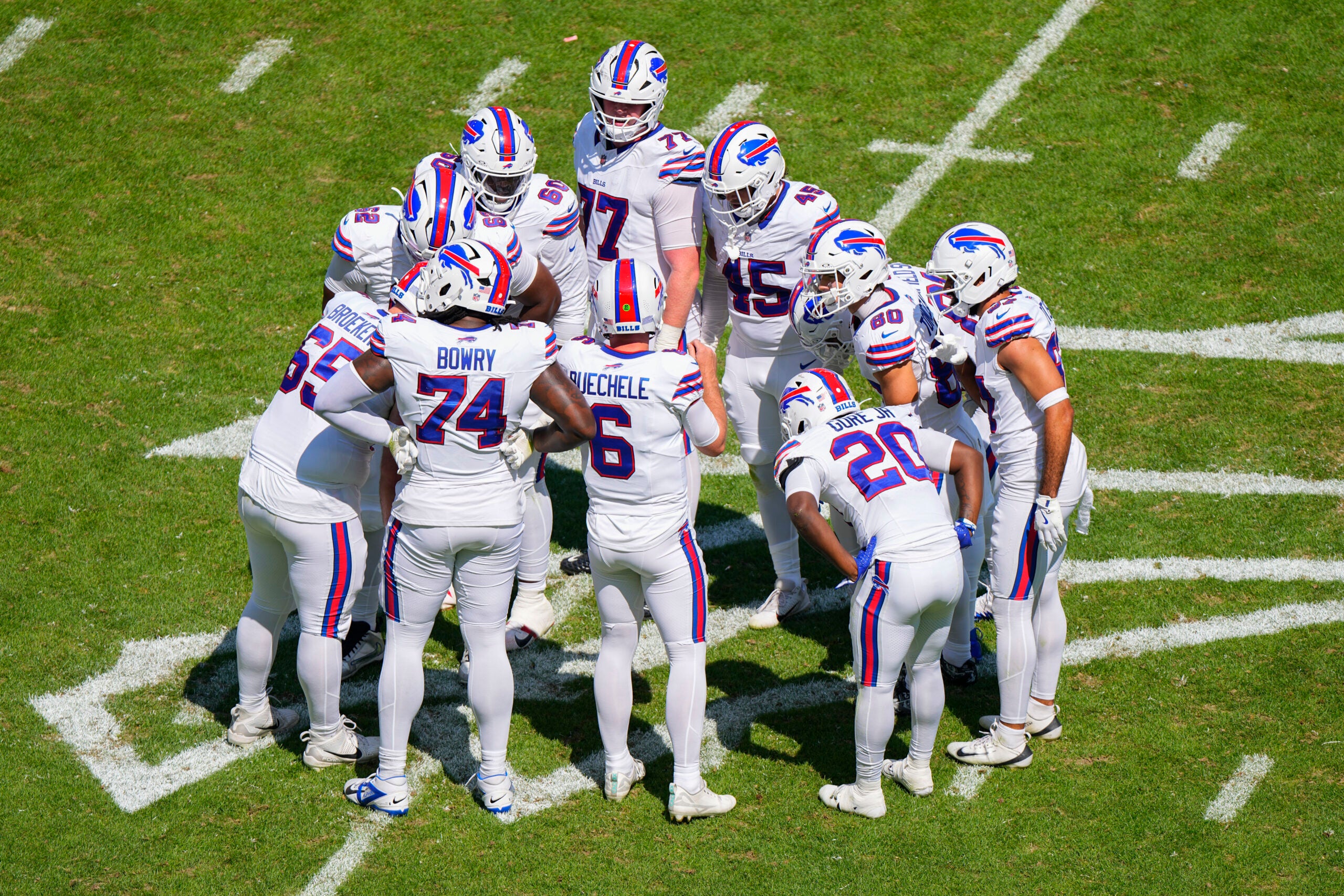 Aug 15, 2026; Orchard Park, New York, USA; Buffalo Bills quarterback Shane Buechele (6) calls the play in the huddle during the second half against the Carolina Panthers at New Highmark Stadium.