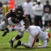 Aug 15, 2026; Chicago, Illinois, USA; Chicago Bears defensive end Jamree Kromah (59) sacks Cleveland Browns quarterback Dillon Gabriel (6) during the second half at Soldier Field.