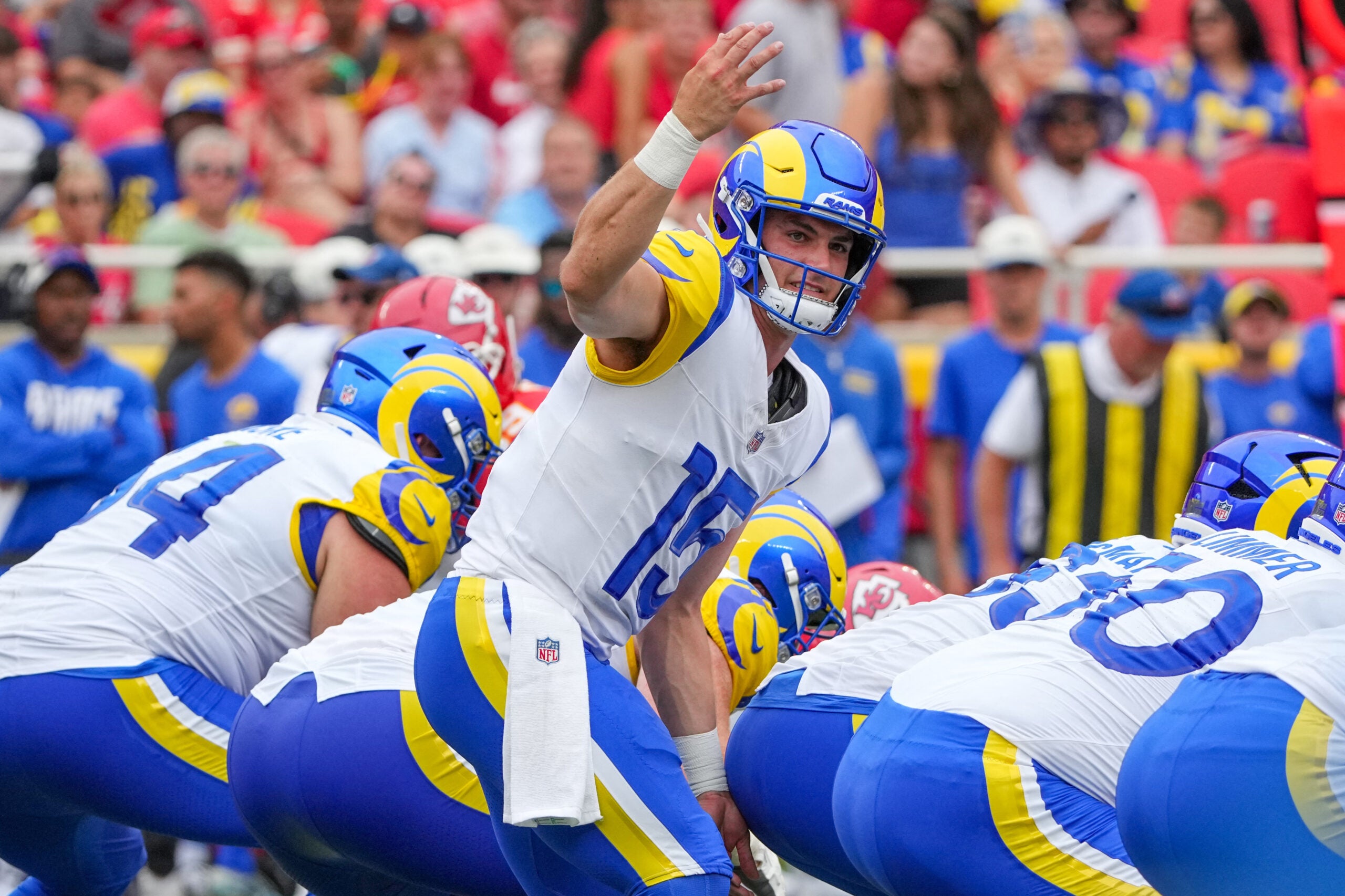 Aug 15, 2026; Kansas City, Missouri, USA; Los Angeles Rams quarterback Ty Simpson (15) signals at the line against the Kansas City Chiefs during the first half of the pre season game at Arrowhead Stadium.