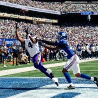Aug 15, 2026; East Rutherford, New Jersey, USA; Minnesota Vikings wide receiver Myles Price (4) catches a pass for a touchdown as New York Giants cornerback Korie Black (38) defends during the first half at MetLife Stadium.