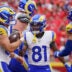 Aug 15, 2026; Kansas City, Missouri, USA; Los Angeles Rams running back Dean Connors (33) celebrates with wide receiver Brennan Presley (81) after scoring against the Kansas City Chiefs during the second half of the pre season game at Arrowhead Stadium.