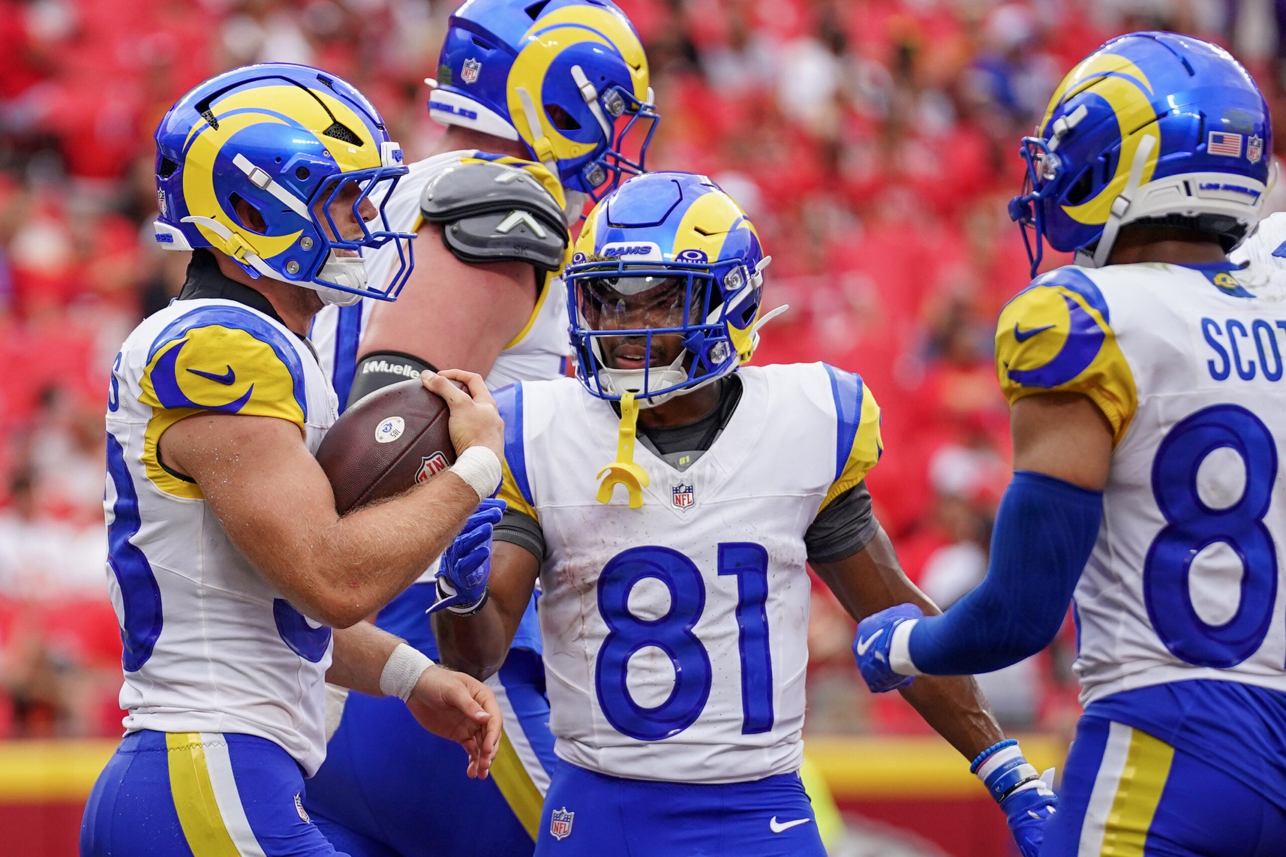Aug 15, 2026; Kansas City, Missouri, USA; Los Angeles Rams running back Dean Connors (33) celebrates with wide receiver Brennan Presley (81) after scoring against the Kansas City Chiefs during the second half of the pre season game at Arrowhead Stadium.