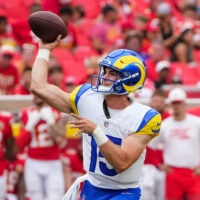 Aug 15, 2026; Kansas City, Missouri, USA; Los Angeles Rams quarterback Ty Simpson (15) throws a pass against the Kansas City Chiefs during the second half of the pre season game at Arrowhead Stadium.