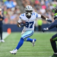 Aug 15, 2026; Seattle, Washington, USA; Dallas Cowboys running back Phil Mafah (37) carries the ball after a catch against the Seattle Seahawks during the first half at Lumen Field.