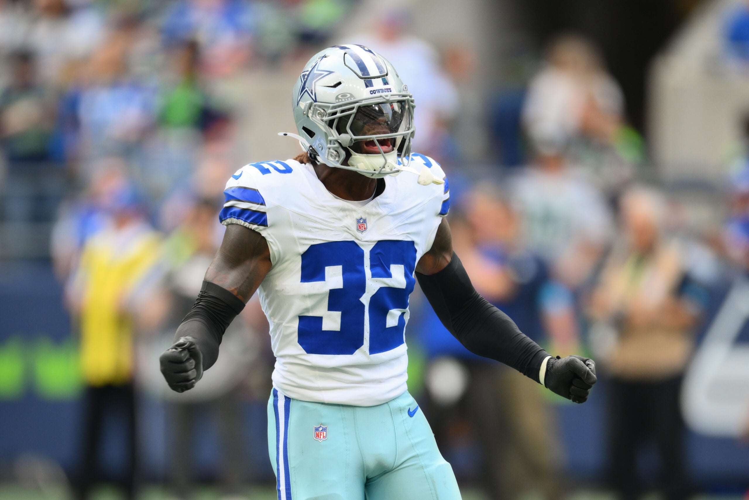 Aug 15, 2026; Seattle, Washington, USA; Dallas Cowboys specialist Julius Wood (32) reacts to a special teams play during the first half against the Seattle Seahawks at Lumen Field.