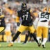 Aug 13, 2026; Pittsburgh, Pennsylvania, USA; Pittsburgh Steelers offensive tackle Broderick Jones (77) looks to block Green Bay Packers defensive end Arron Mosby (53) during the second half at Acrisure Stadium.