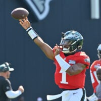 Aug 19, 2026; Foxborough, Massachusetts, USA; Philadelphia Eagles quarterback Jalen Hurts (1) throws a pass during training camp at Gillette Stadium.