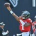 Aug 19, 2026; Foxborough, Massachusetts, USA; Philadelphia Eagles quarterback Jalen Hurts (1) throws a pass during training camp at Gillette Stadium.