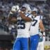Carolina Panthers running back Jonathon Brooks (25) reacts after scoring a touchdown against the Jacksonville Jaguars in the first quarter during a preseason game at EverBank Stadium.