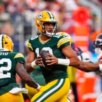 Aug 21, 2026; Denver, Colorado, USA; Green Bay Packers quarterback Jordan Love (10) during in the first quarter of a preseason game against the Denver Broncos at Empower Field at Mile High