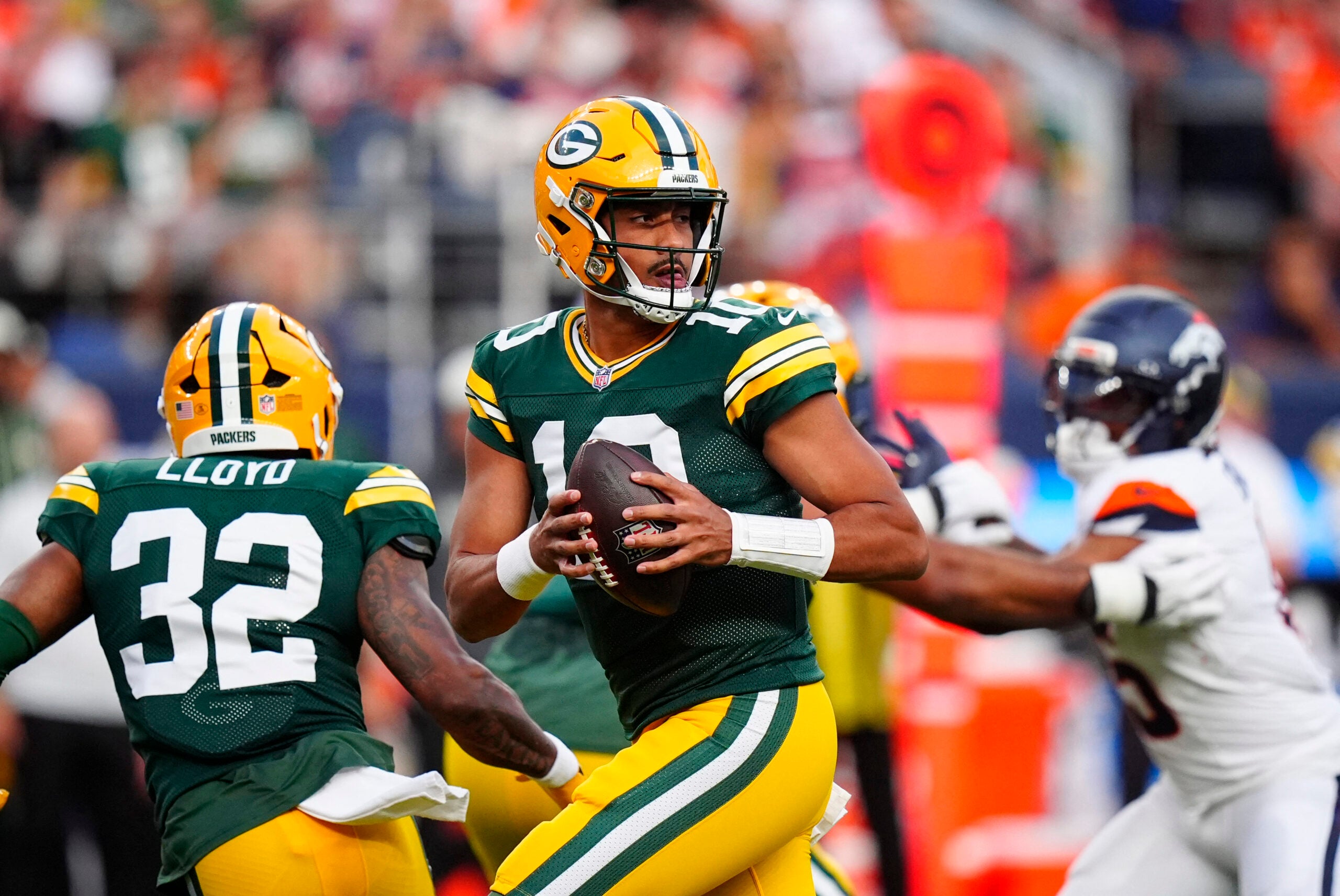 Aug 21, 2026; Denver, Colorado, USA; Green Bay Packers quarterback Jordan Love (10) during in the first quarter of a preseason game against the Denver Broncos at Empower Field at Mile High